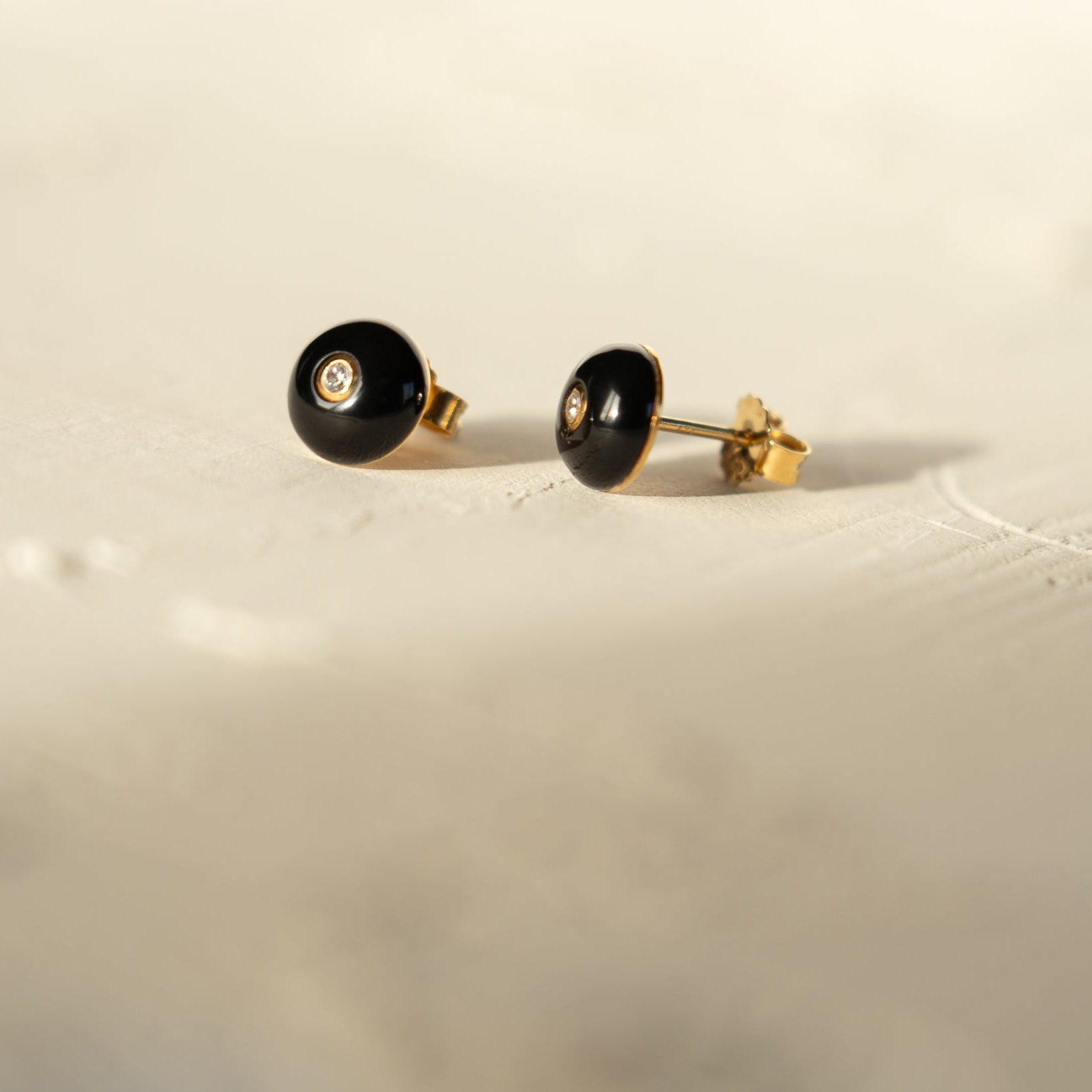 Mini Celt Studs Black in Gold