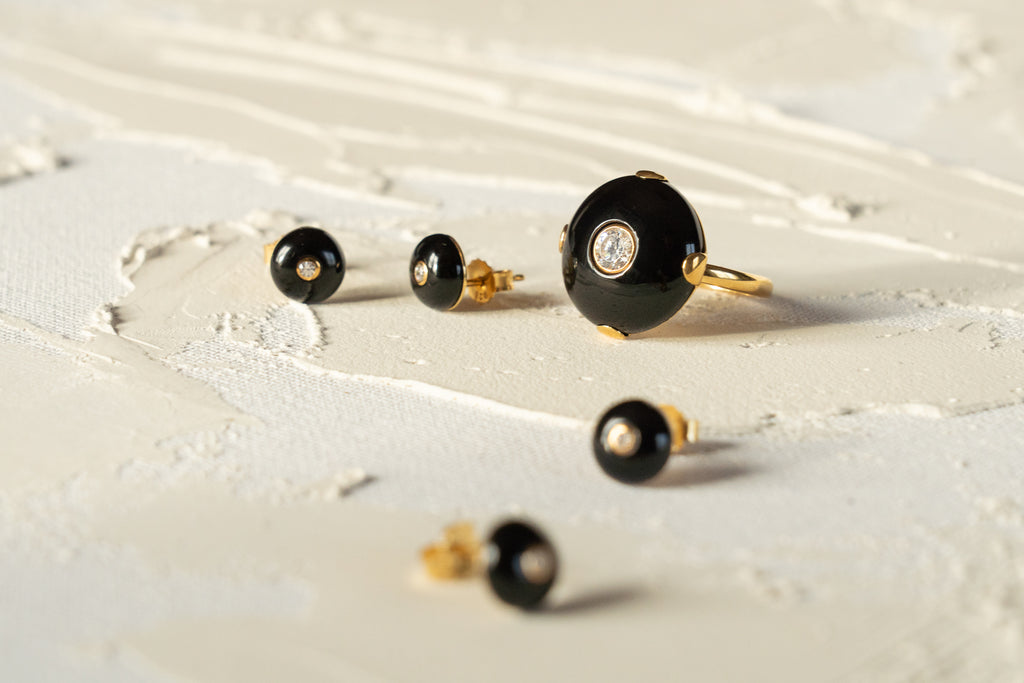 Mini Celt Studs Black in Gold